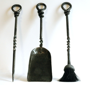 Twisted fire irons wall hung